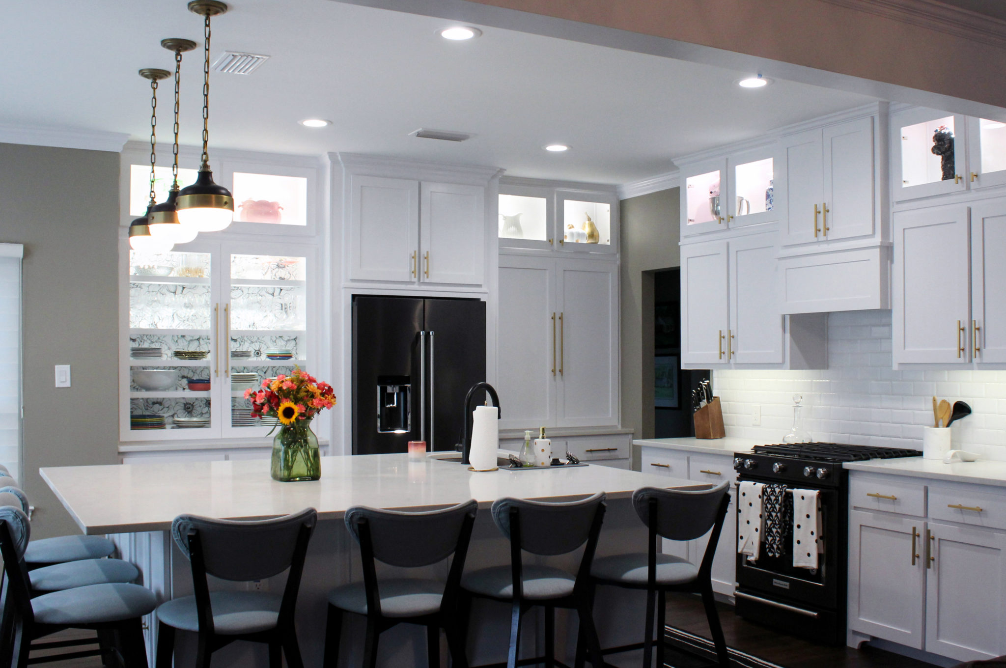 Beautiful White Kitchen with Black Stainless Steel Appliances